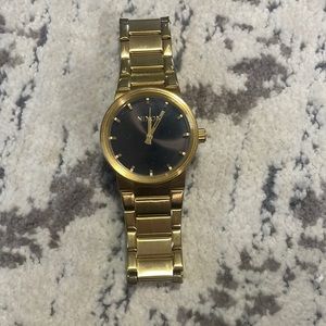Nixon cannon gold mens watch